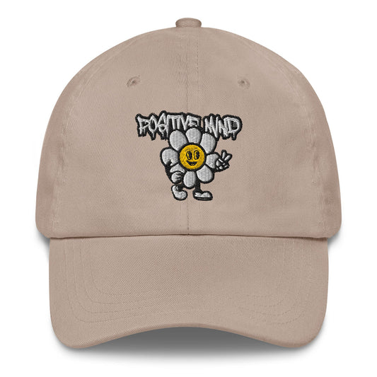 Smiling cartoon flower with white petals and yellow face giving a peace sign, under bold graffiti-style text reading "Positive Mind" on black background...brown front