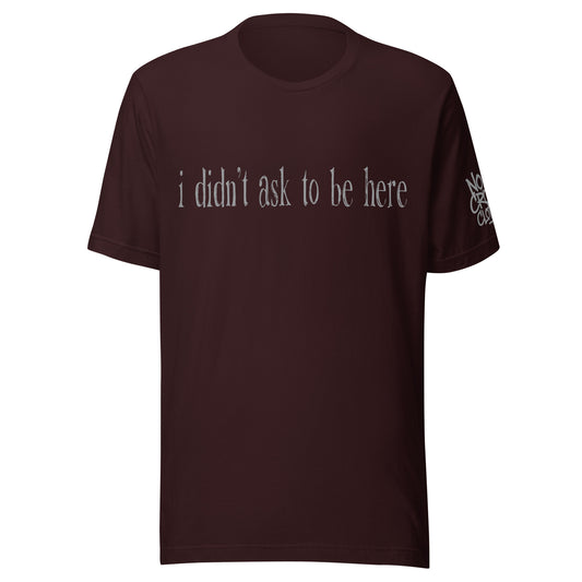 t shirt with “I didn’t ask to be here” text minimalist introvert clothing design....oxblood front