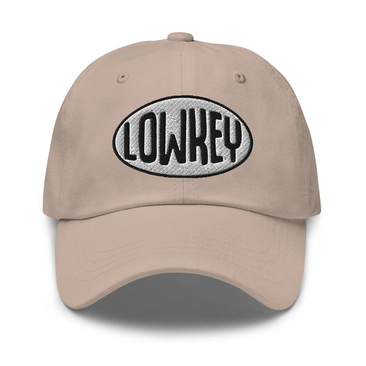 LOWKEY embroidered dad hat by No Crowd Clothing with a relaxed unstructured fit, minimal front text, and washed fabric for a clean, low-profile introvert style.....tan front