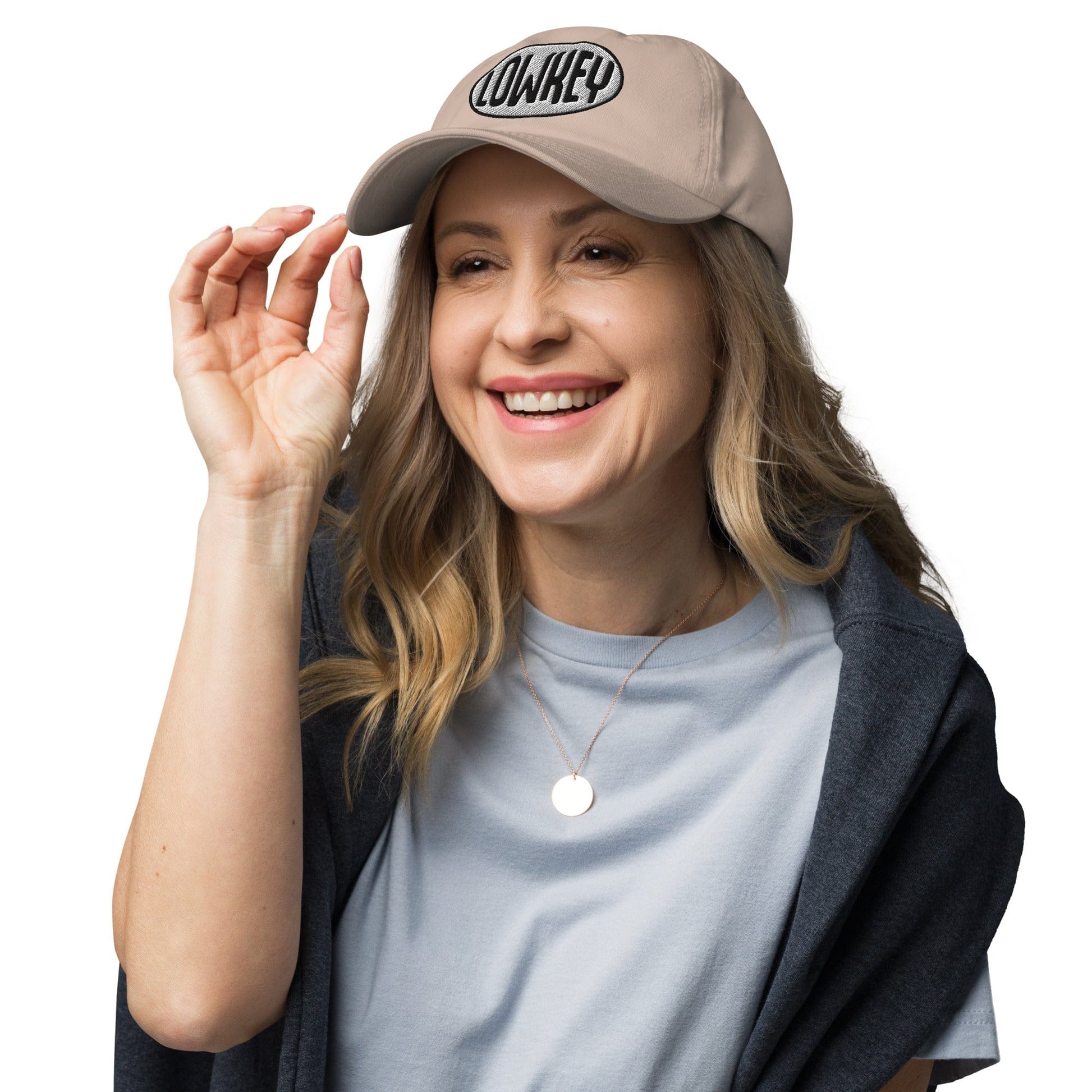LOWKEY embroidered dad hat by No Crowd Clothing with a relaxed unstructured fit, minimal front text, and washed fabric for a clean, low-profile introvert style.....model front
