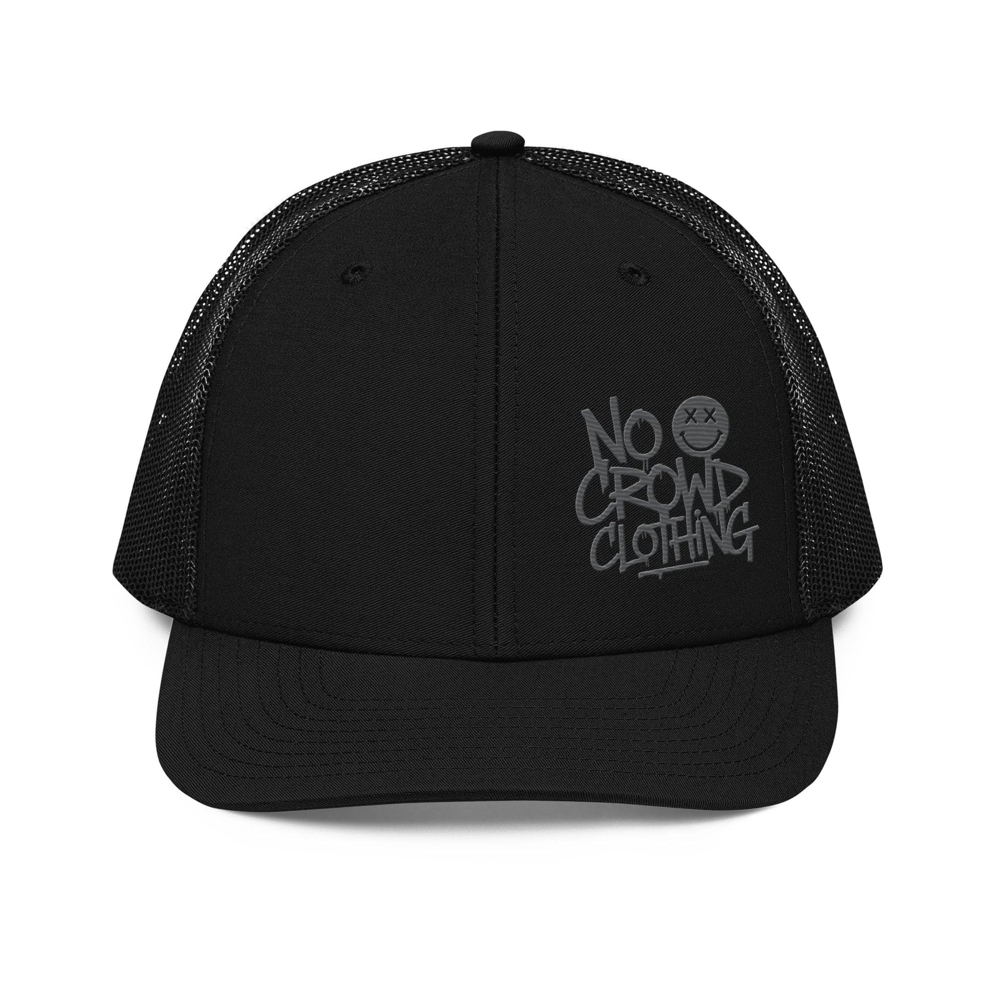Black trucker hat with mesh back and structured front, designed by No Crowd Clothing, displayed on a plain background..front