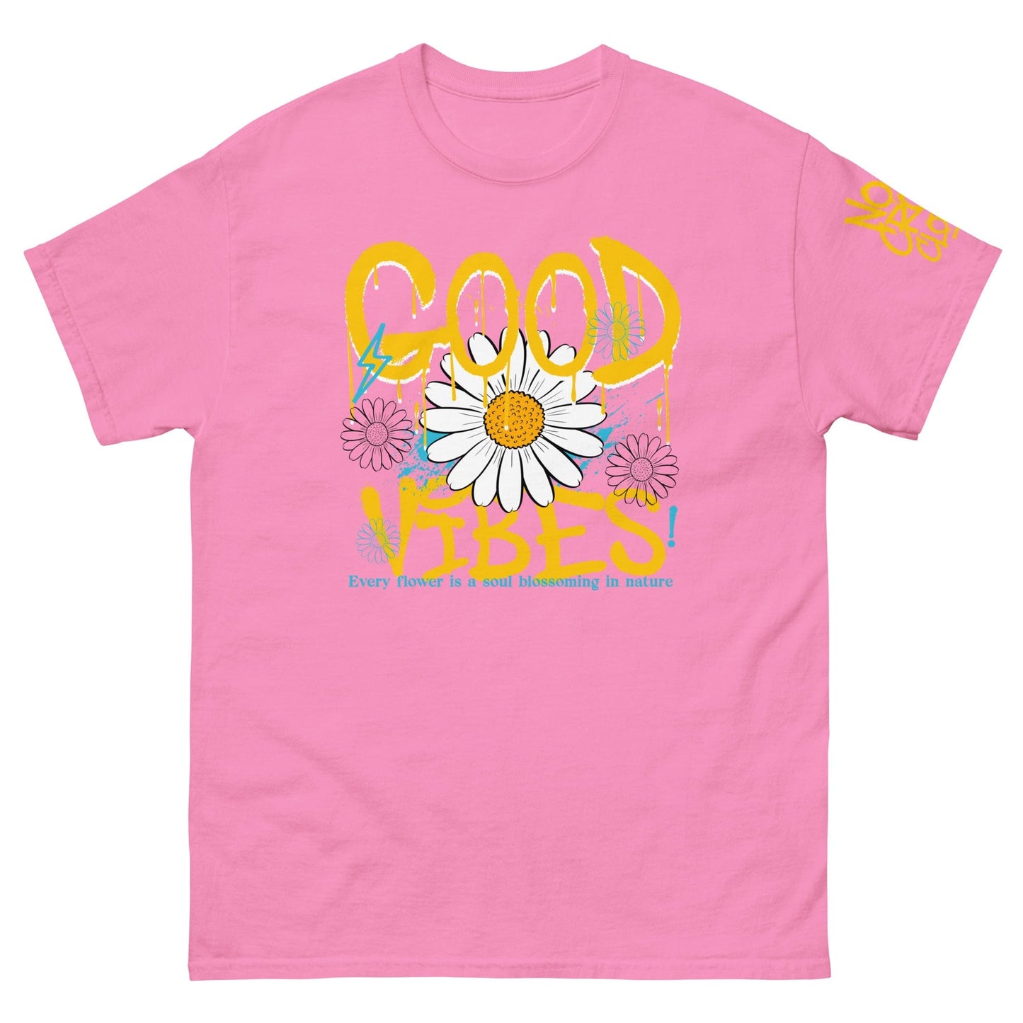 "Good Vibes" graphic tee with bold graffiti-style text, daisy flower design, and splashes of blue, promoting positivity and happiness to reduce anxiety...pink