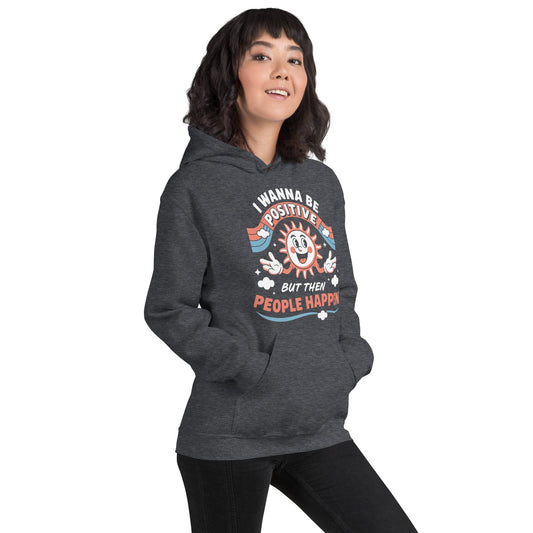 Gray hoodie with a retro smiling sun design and the funny phrase “I Wanna Be Positive But Then People Happen,” featuring vintage-style colors and clouds...gray