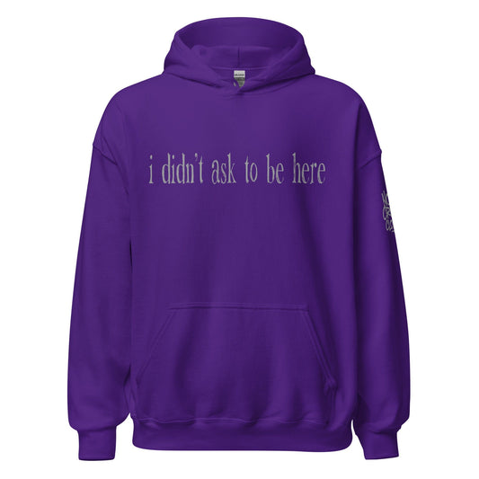 Hoodie with “I didn’t ask to be here” text minimalist introvert clothing design...purple front