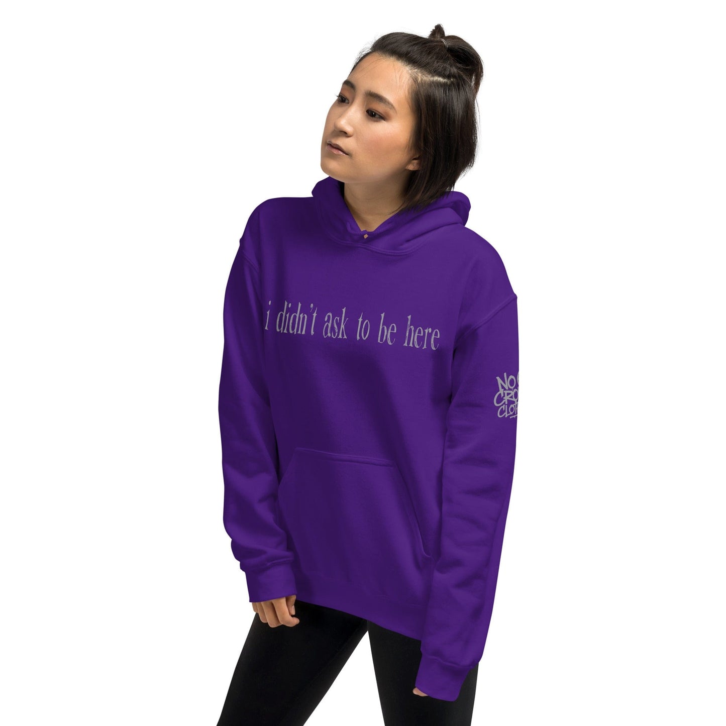 Hoodie with “I didn’t ask to be here” text minimalist introvert clothing design...purple model front