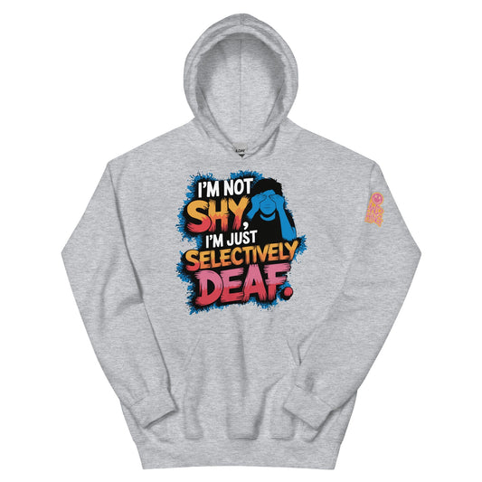 No Crowd Clothing’s 'I'm Not Shy, I'm Just Selectively Deaf' t-shirt offers a playful take on social anxiety. Perfect for those who use humor to cope and prefer quiet in a noisy world...grey