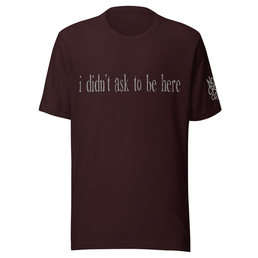 t shirt with “I didn’t ask to be here” text minimalist introvert clothing design....oxblood front
